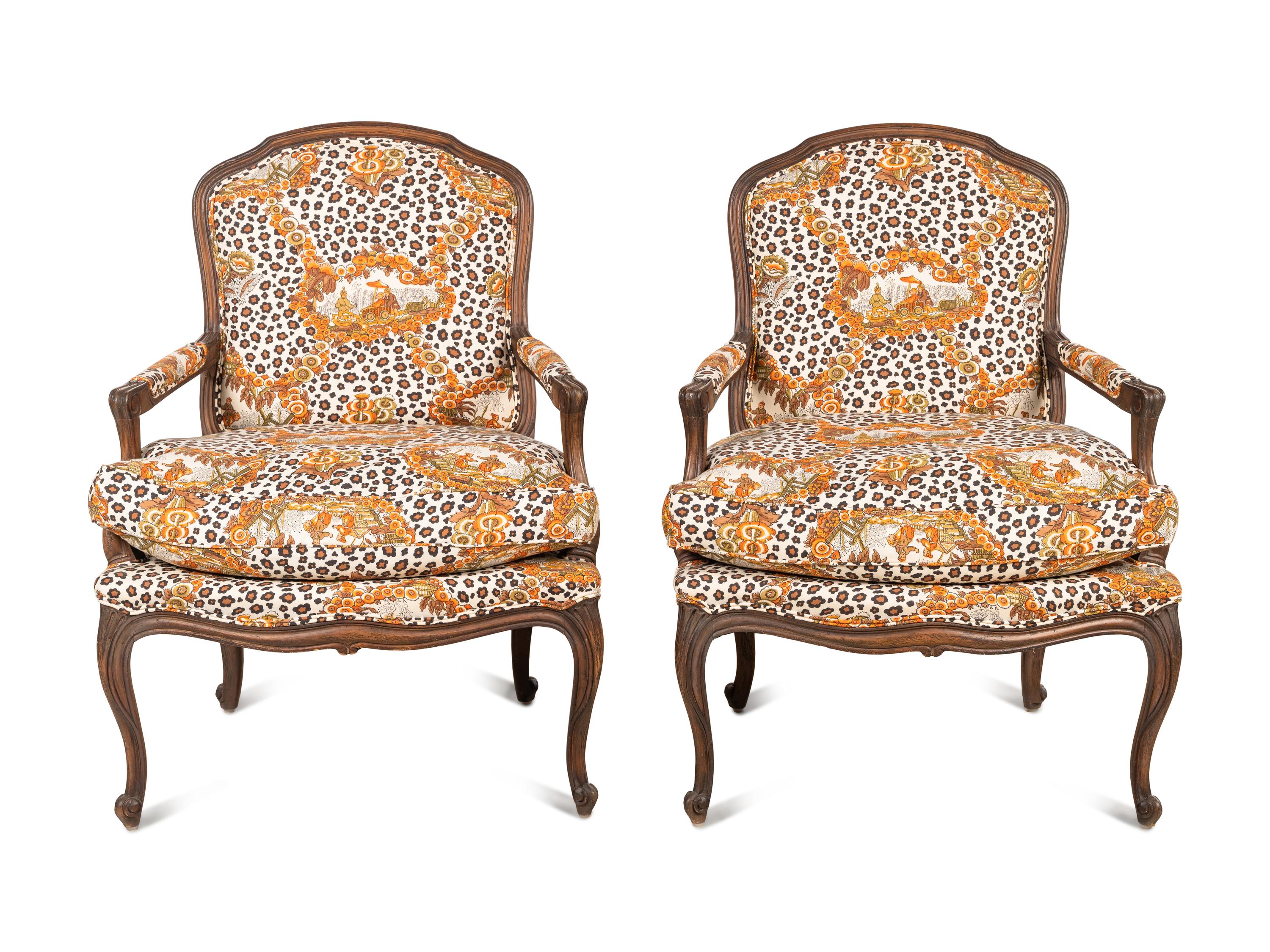 A Pair of Louis XV Style Oak Fauteuils