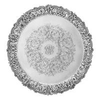 An American Silver Salver, S. Kirk & Son, Baltimore, MD, the rim worked to show rocaille and C-scrolls enclosing the floral and foliate