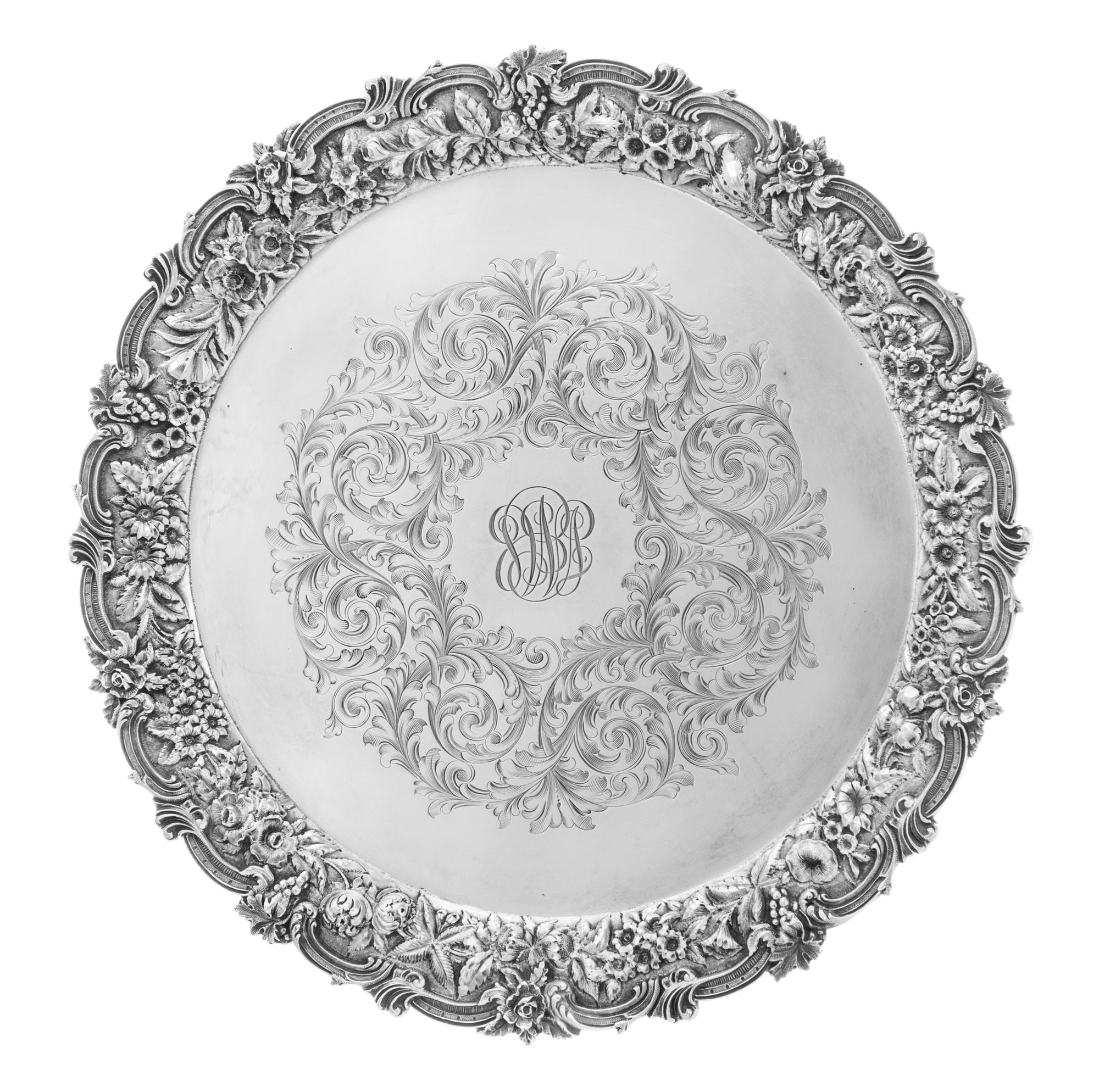 An American Silver Salver, S. Kirk & Son, Baltimore, MD, the rim worked to show rocaille and C-scrolls enclosing the floral and foliate