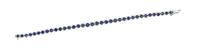 An 18 Karat White Gold and Sapphire Line Bracelet, 7.30 dwts.