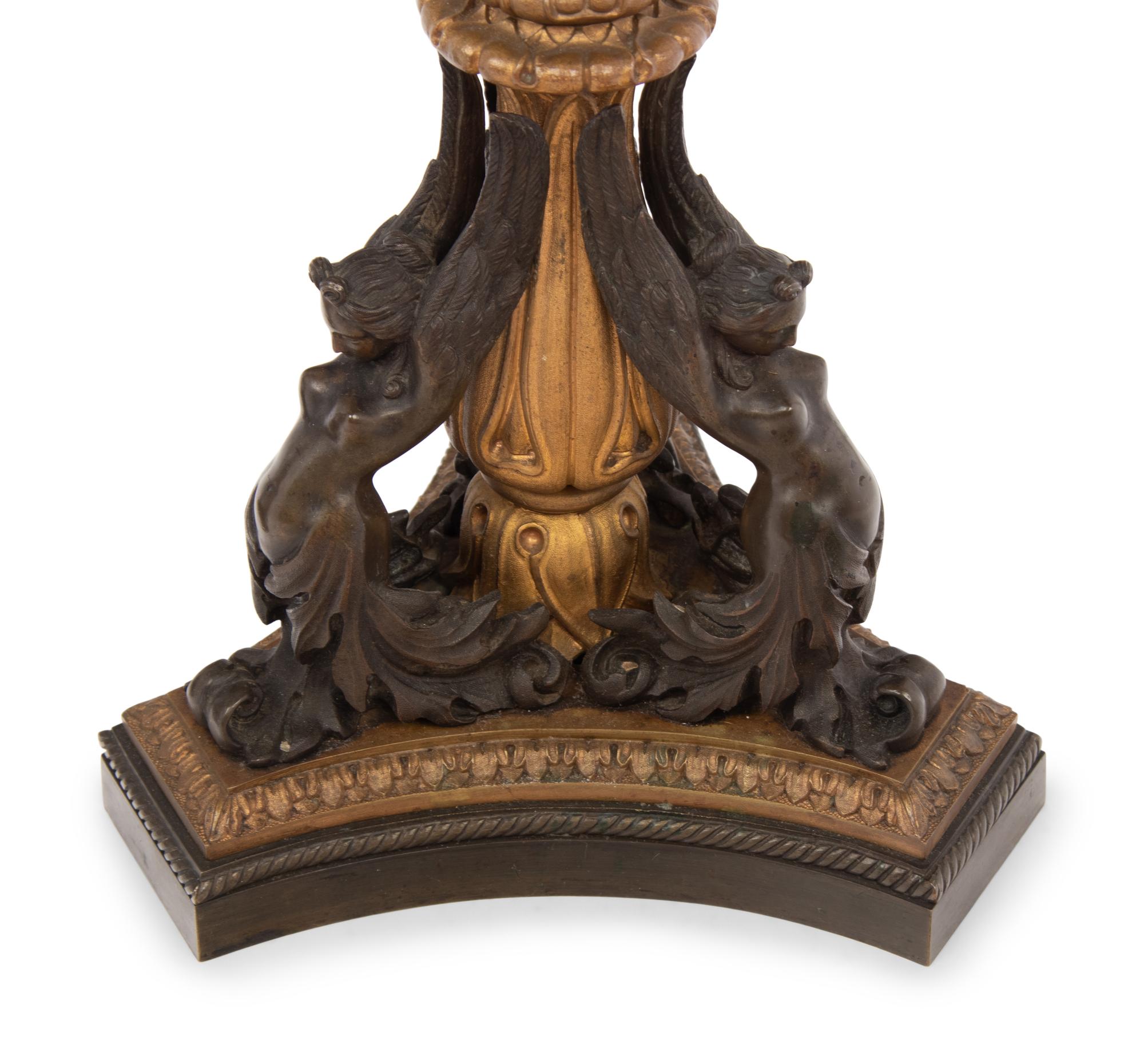 A Pair of French Neoclassical Gilt and Patinated Bronze Seven-Light Candelabra