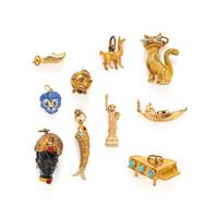 COLLECTION OF YELLOW GOLD CHARMS