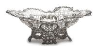 A Victorian Silver Basket, Likely William Comyns, London, 1890, having a pierced body with a C-scroll and floral decorated rim and base