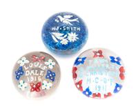 Three American Commemorative Glass Paperweights