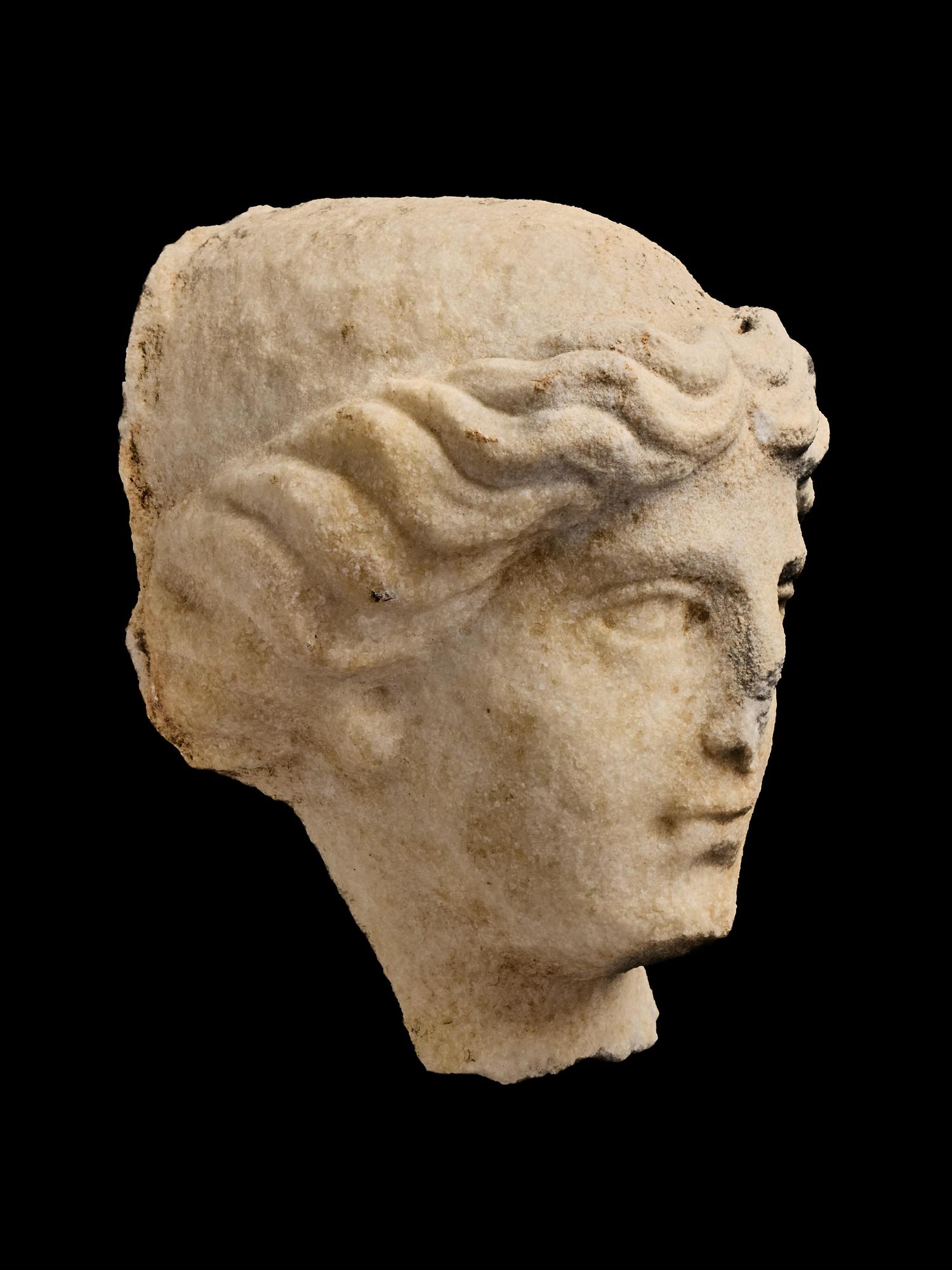 A Roman Marble Head of a Goddess