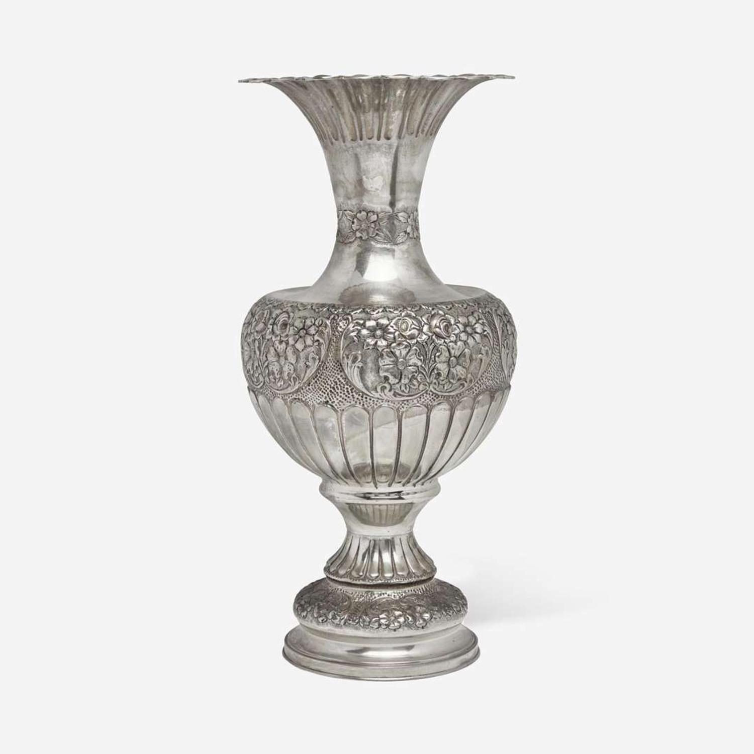 A large sterling silver floral repoussé vase late 19th / early 20th century