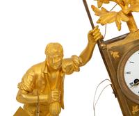 A Restauration Gilt and Patinated Bronze "Gardener" Clock