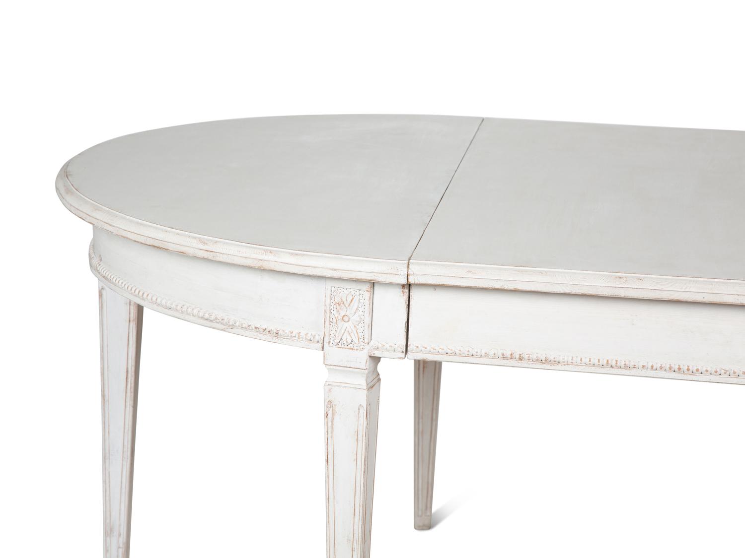 A Louis XVI Style Painted Dining Table — 20TH CENTURY