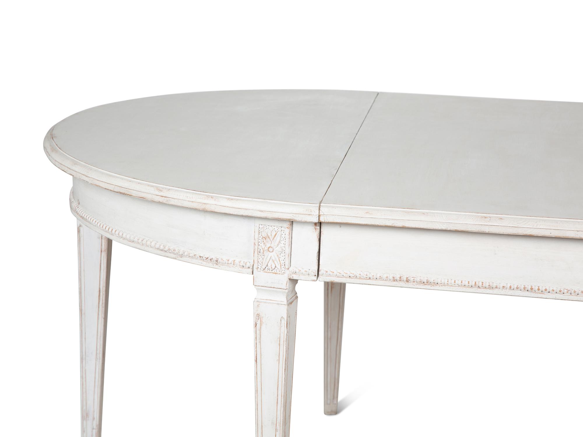 A Louis XVI Style Painted Dining Table — 20TH CENTURY