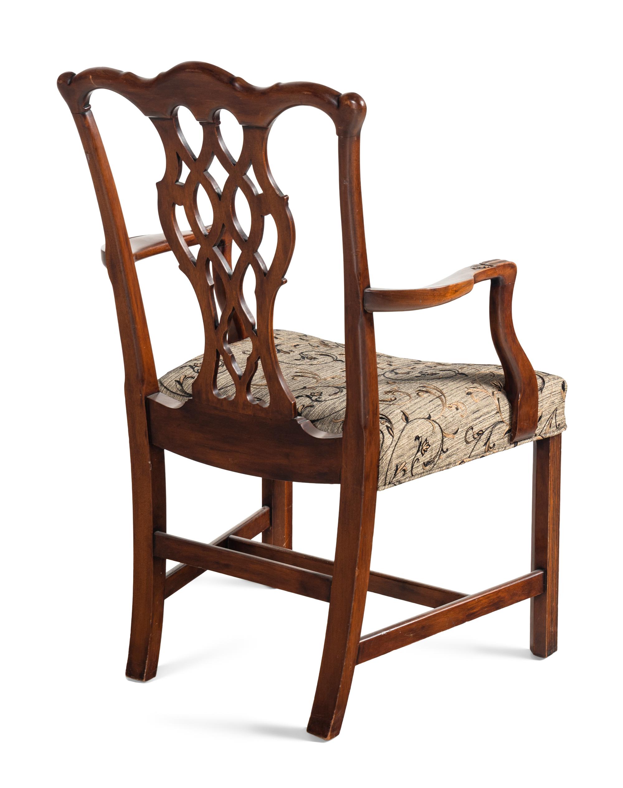 A Pair of George III Style Carved Mahogany Armchairs