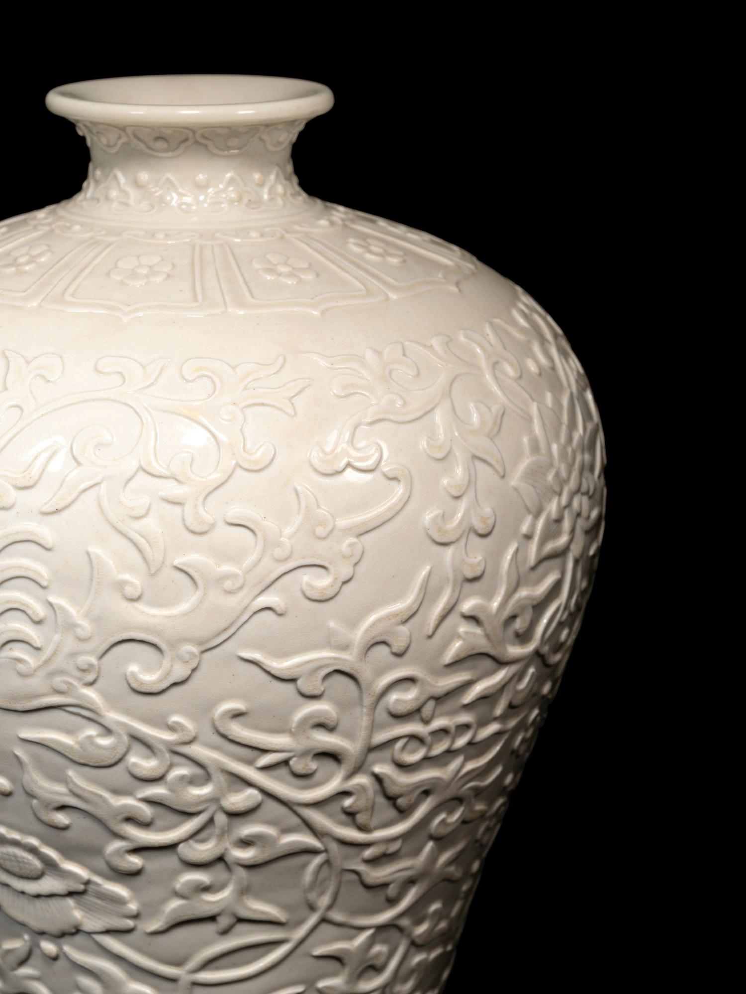 A Carved White Glazed Porcelain Meiping Vase