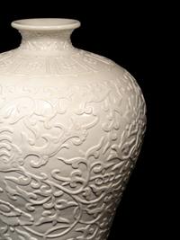 A Carved White Glazed Porcelain Meiping Vase