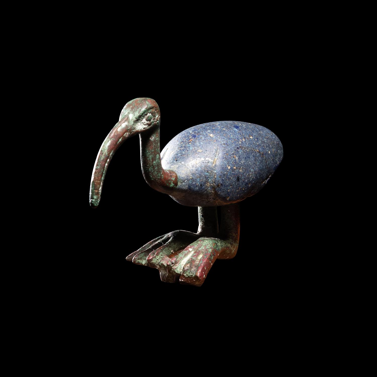 An Egyptian Bronze and Glass Ibis