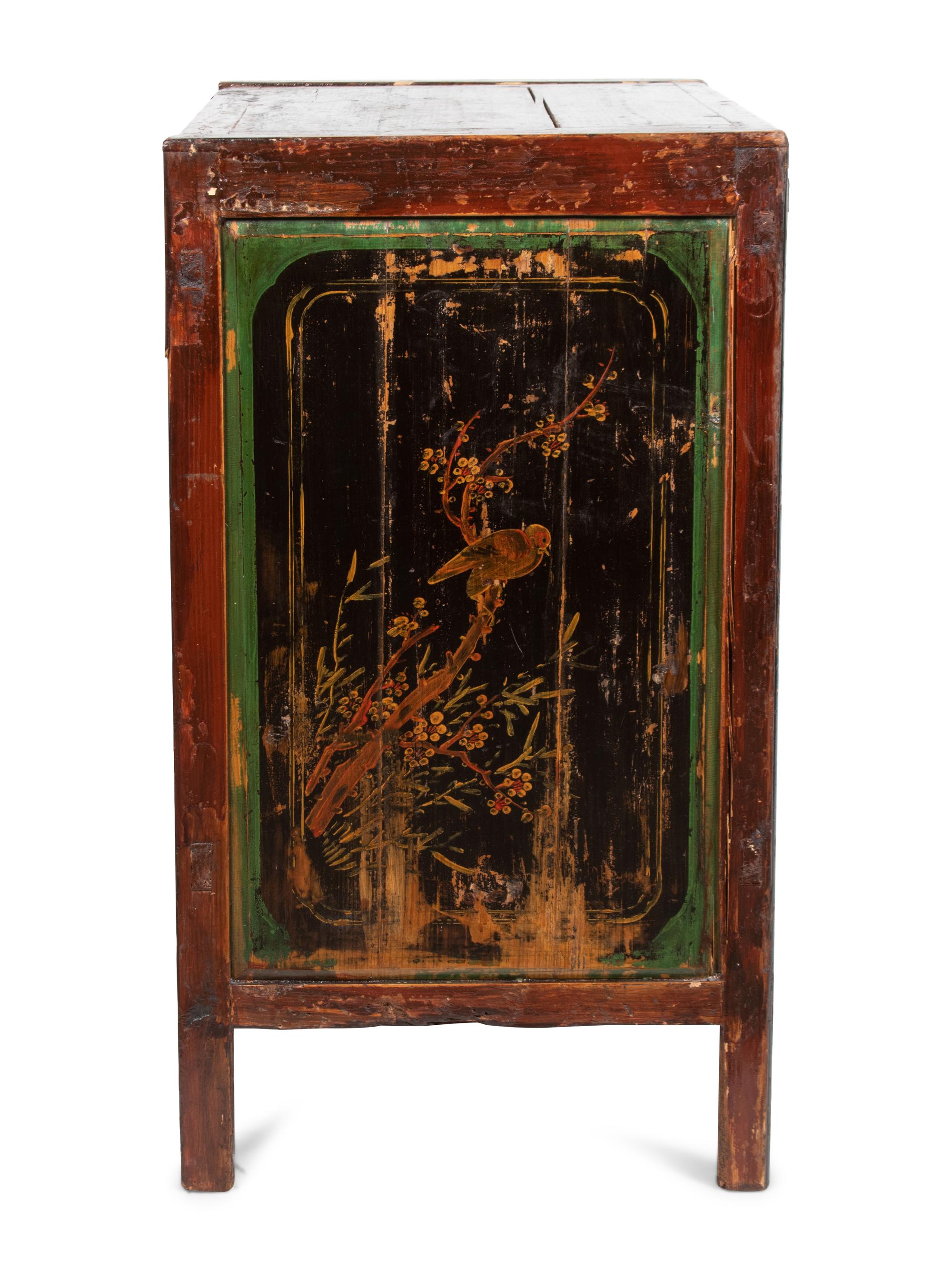 A Chinese Export Cabinet with Carved Lacquer Decoration