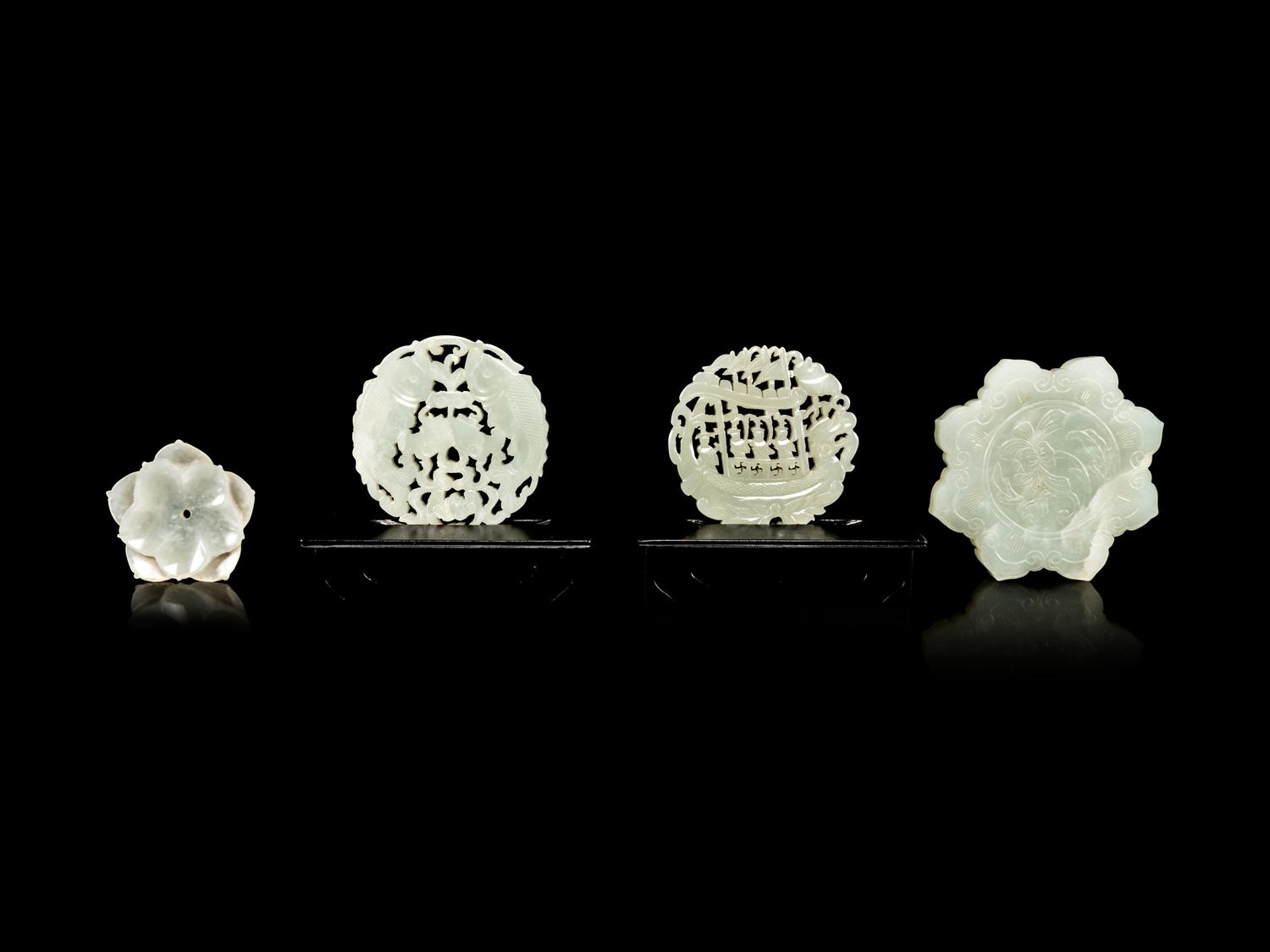 Four Reticulated Celadon Jade Pendants