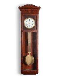 A Large Late Classical Figured Mahogany Wall Clock