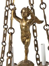 An Empire Style Gilt Bronze and Tole Chandelier