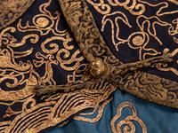 A Blue Ground Embroidered Silk Dragon Robe, Jifu