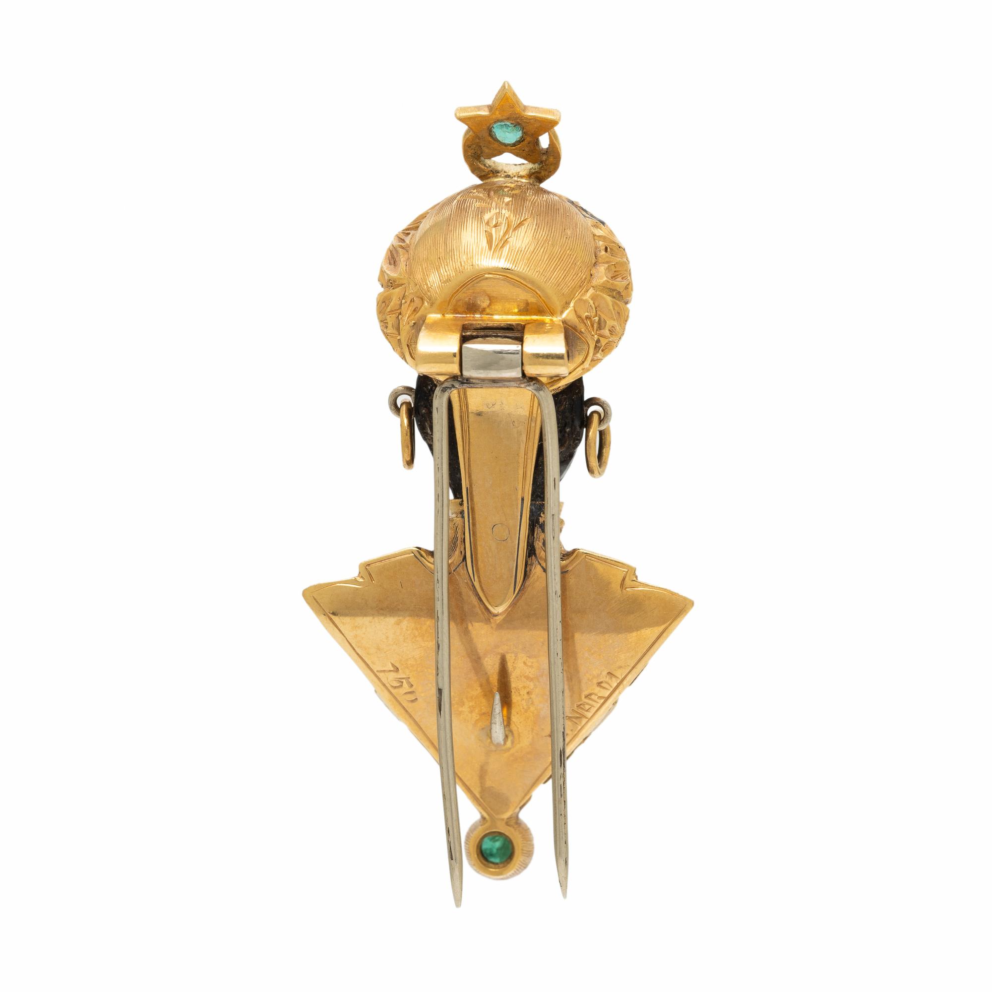 NARDI, YELLOW GOLD AND EMERALD FIGURAL BROOCH