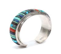 A Hopi Silver, Turquoise, Lapis and Multi-Gem Bracelet, Charles Loloma Length 5 3/4 x opening 7/8 x width 1 1/8 inches.