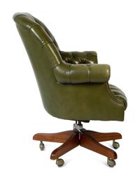A Pair of English Button-Tufted Leather Swivel Chairs — SHEPARD, 20TH CENTURY