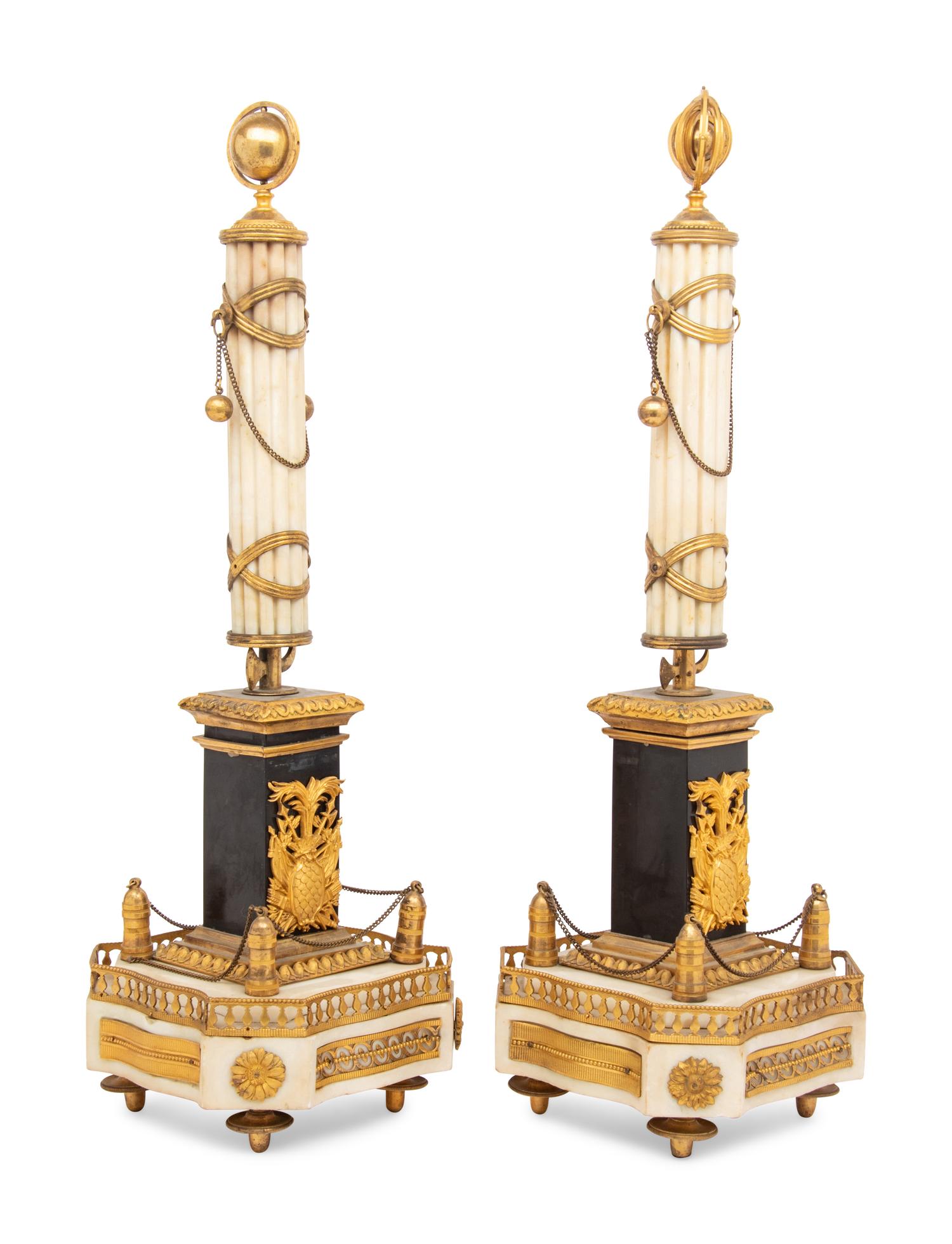 A Pair of Louis XVI Gilt Bronze Mounted Slate and White Marble Obelisks
