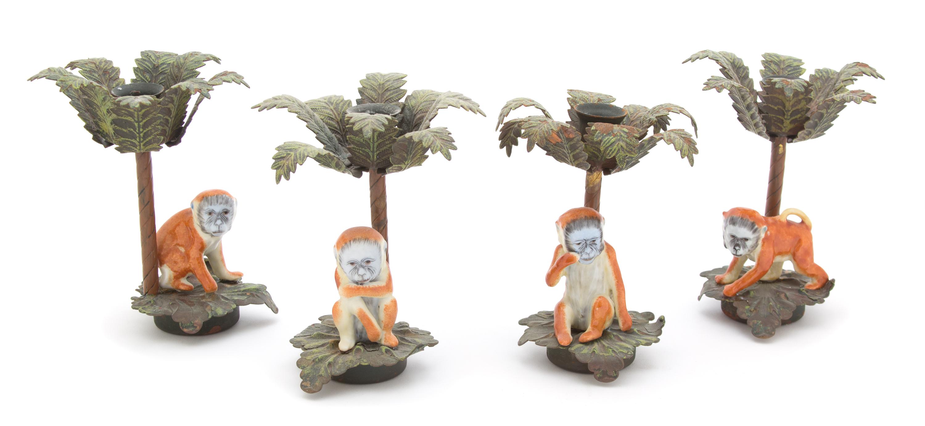 A Group of Four Painted Tole and Ceramic Palm Tree-Form Candlesticks Height 6 1/4 inches. — 20TH CENTURY