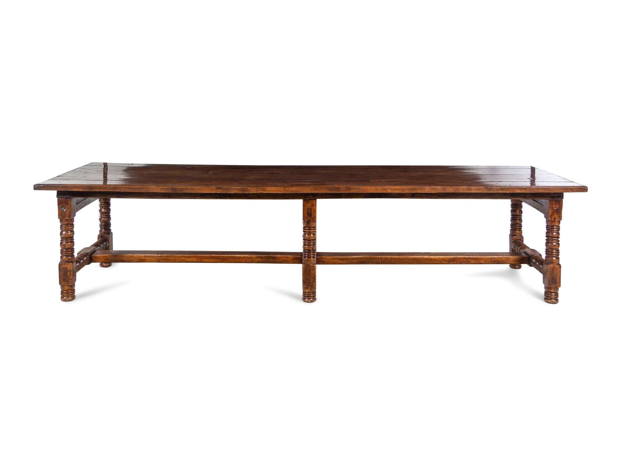 A Spanish or Portuguese Walnut Trestle Table