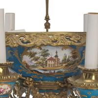 A Louis XVI Style Porcelain Inset Gilt Bronze Six-Light Chandelier