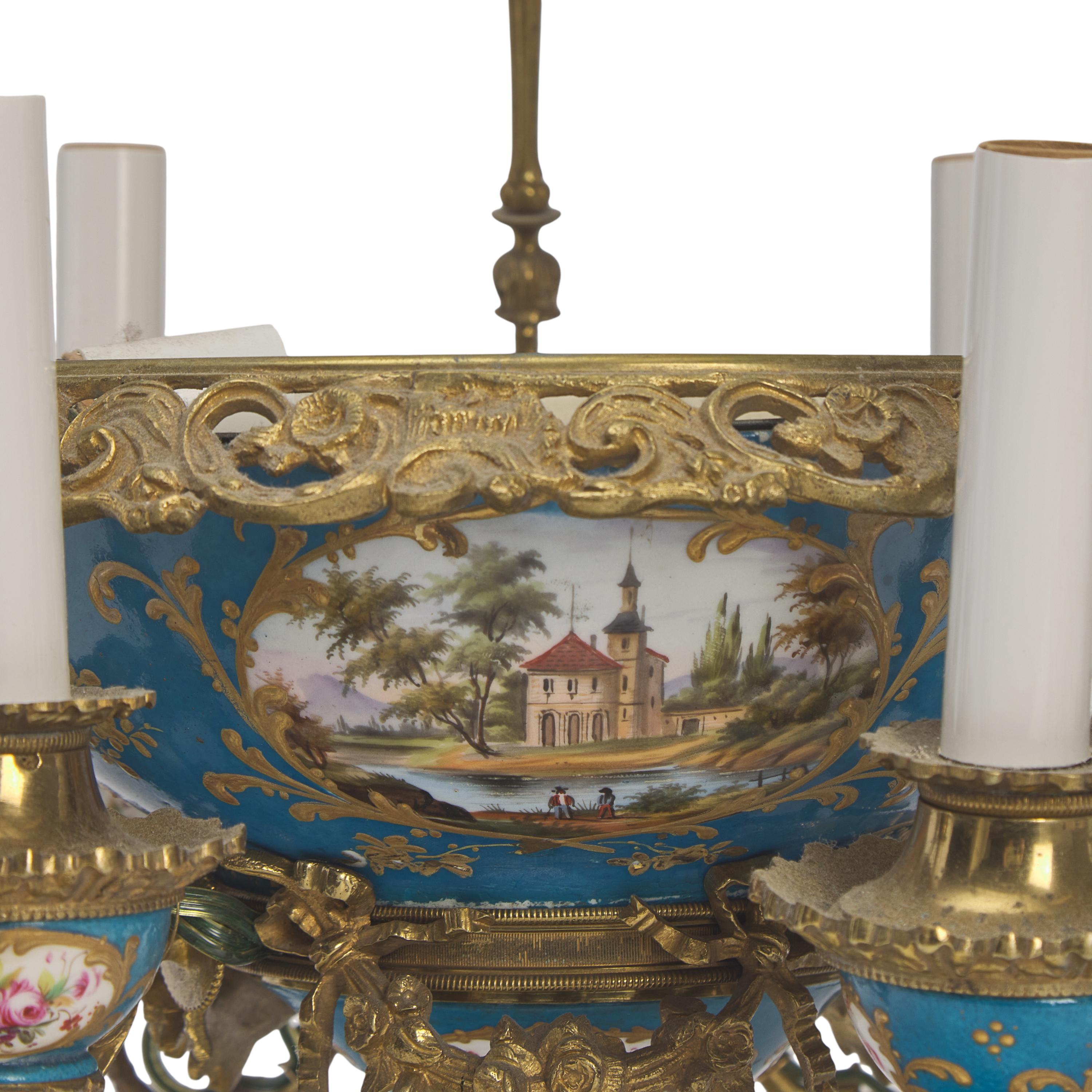 A Louis XVI Style Porcelain Inset Gilt Bronze Six-Light Chandelier