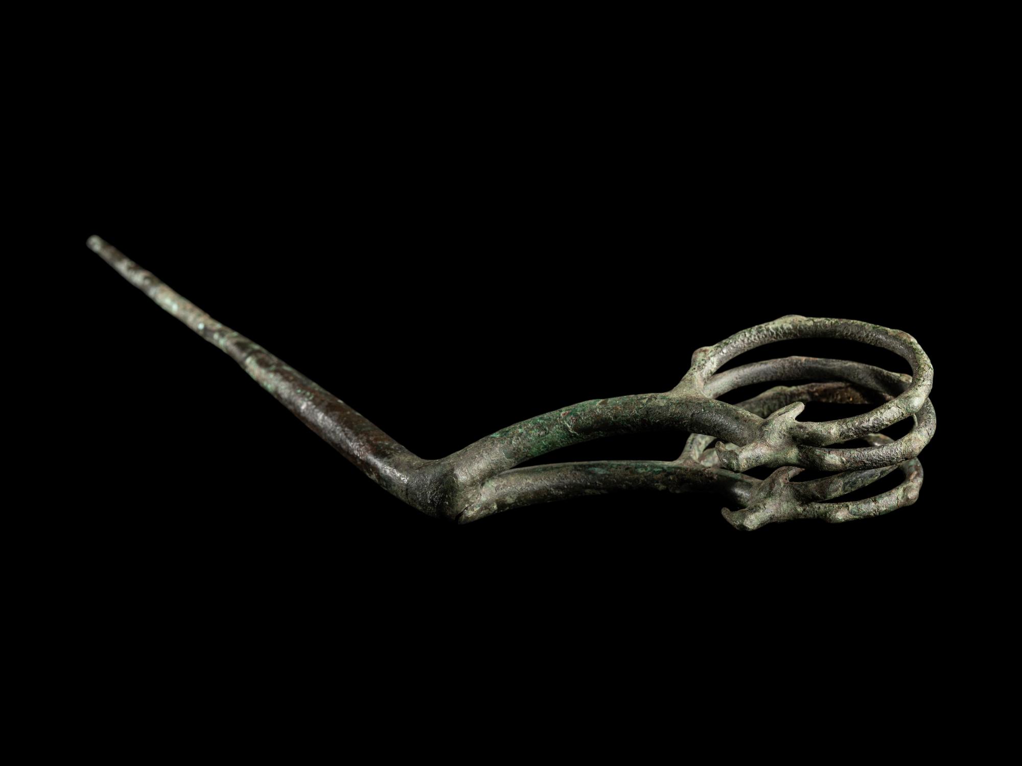 A Luristan Bronze Ibex Fibula