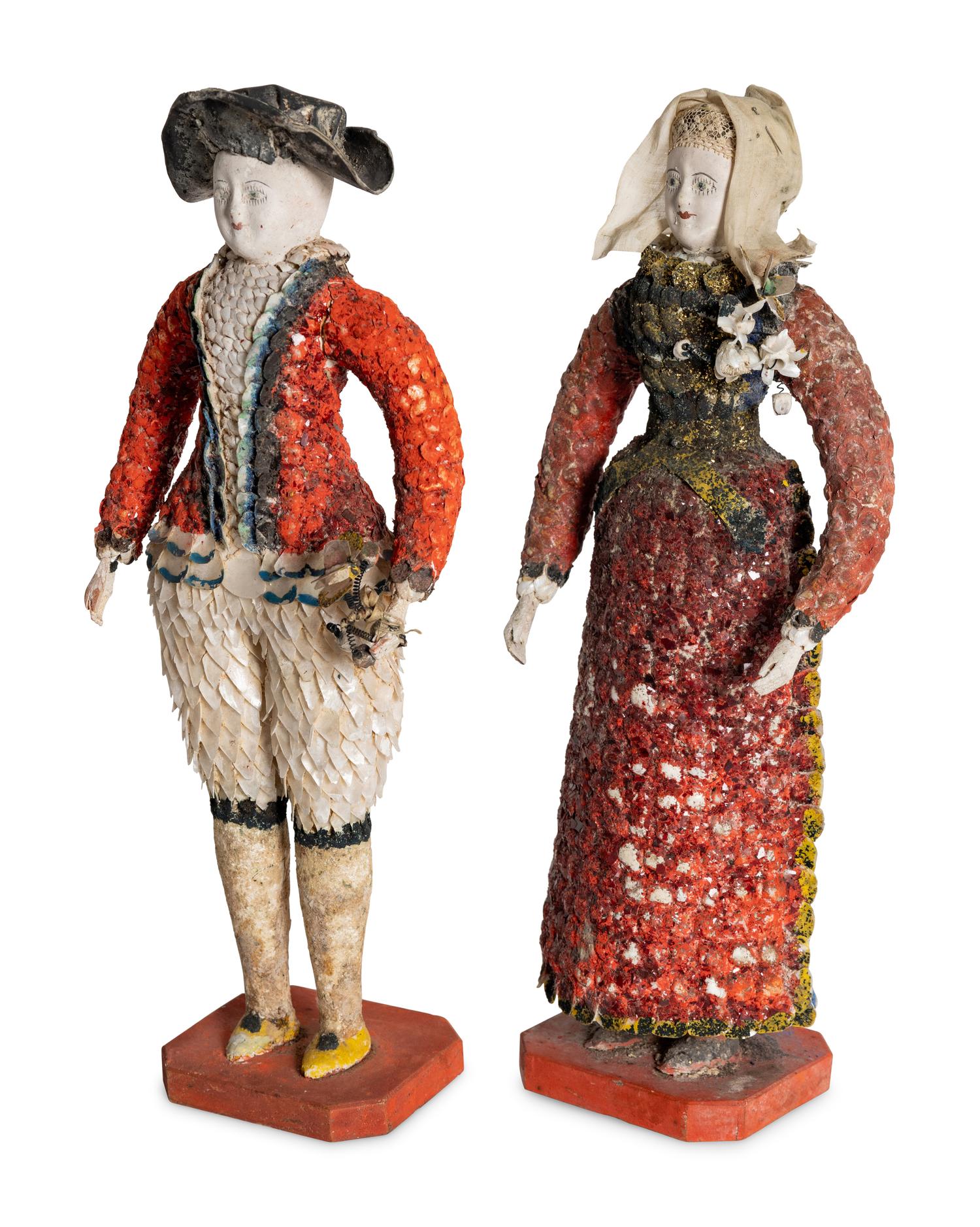A Pair of French Carton Moule "Seaside" Dolls