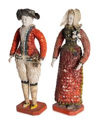 A Pair of French Carton Moule "Seaside" Dolls