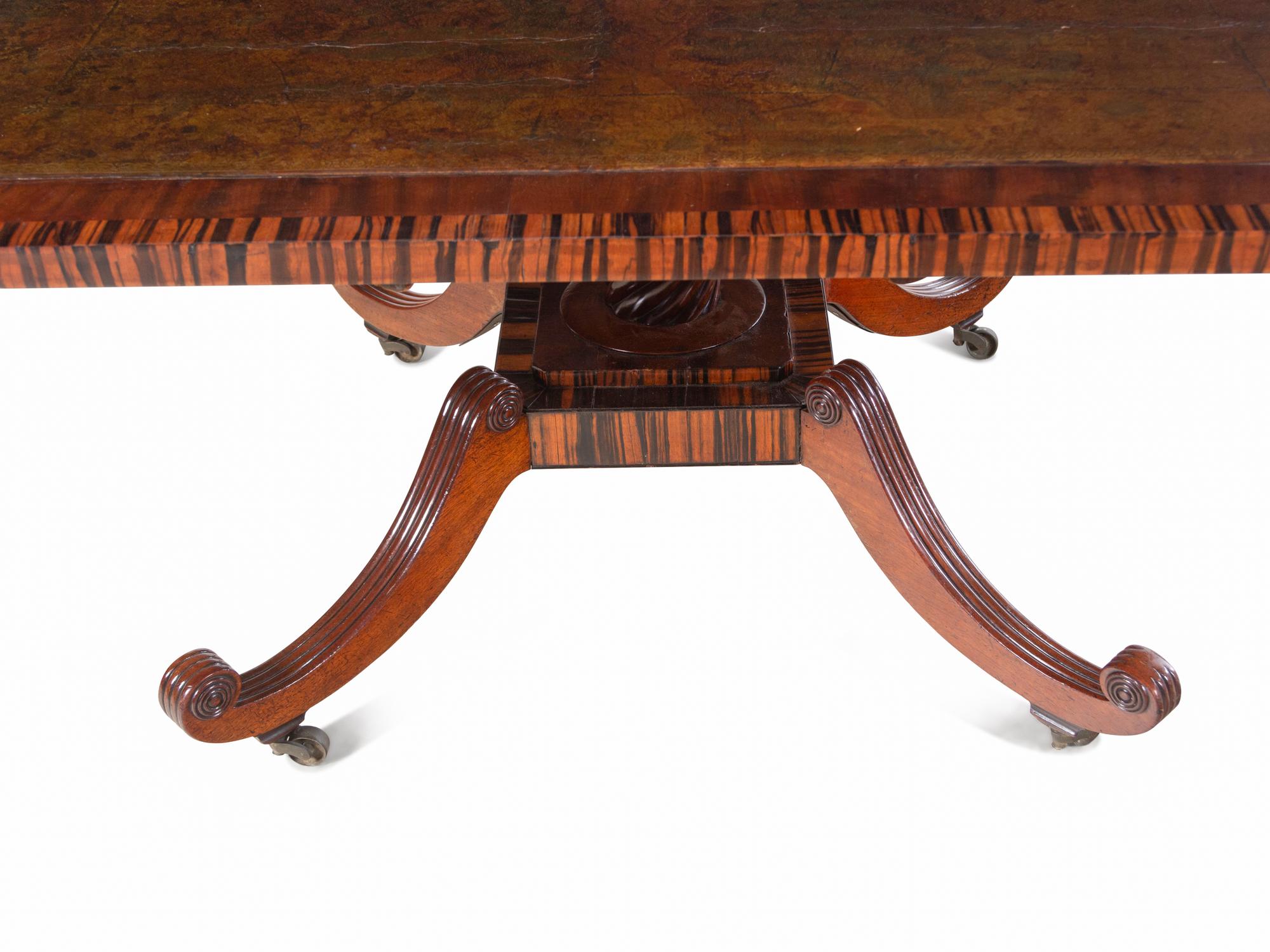 A Regency Calamander or Rosewood and Mahogany Leather-Inset Tilt-Top Table
