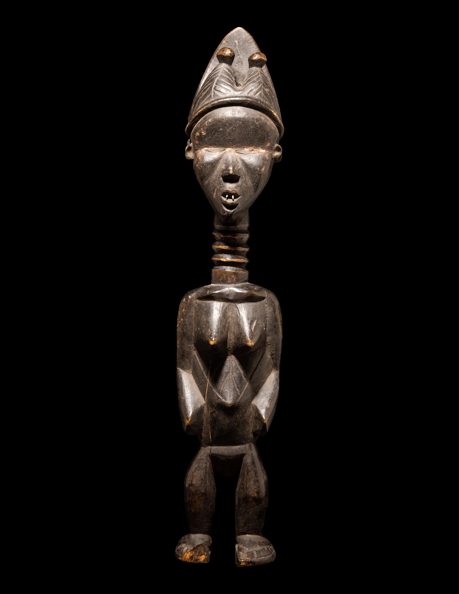 A Baule Wood Janus-Headed Figure