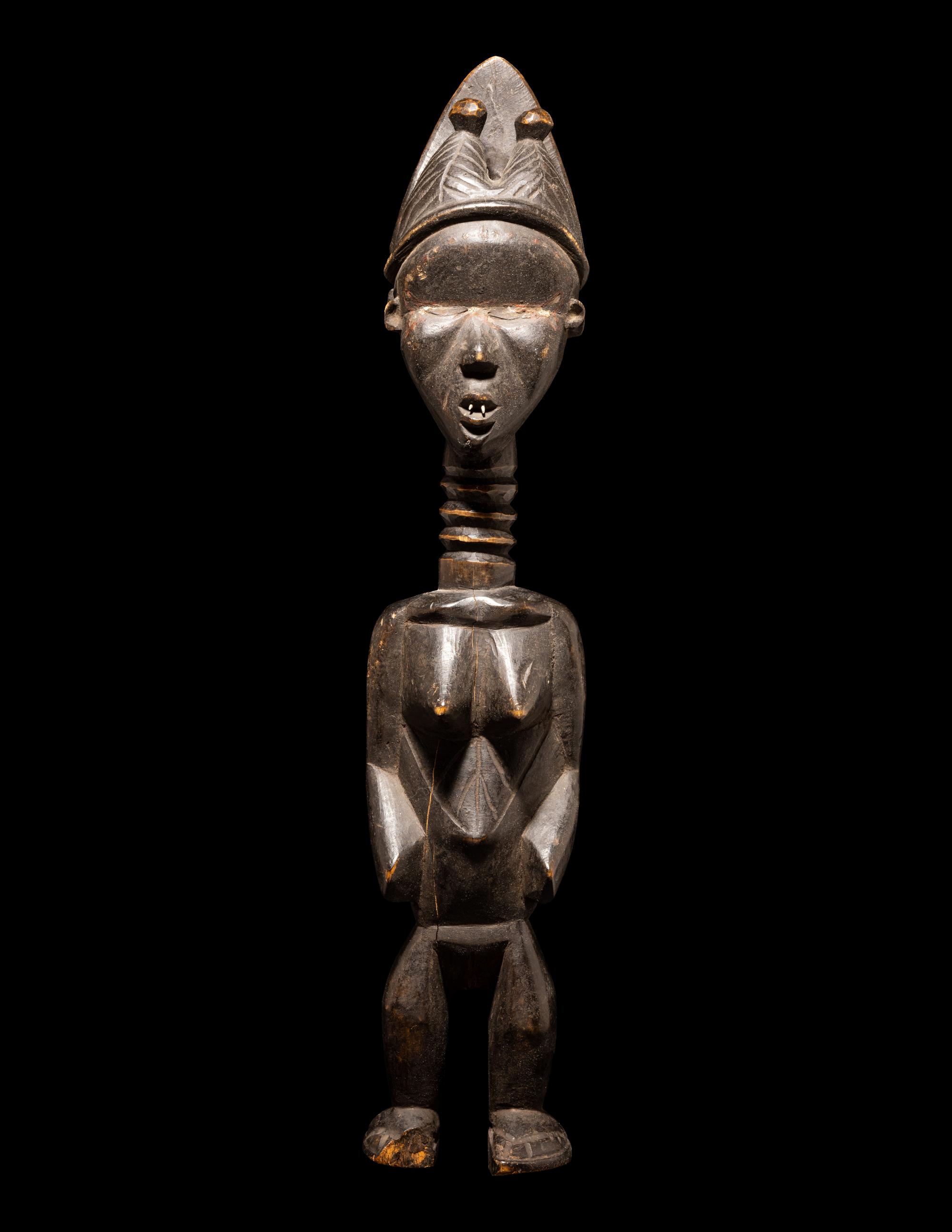A Baule Wood Janus-Headed Figure