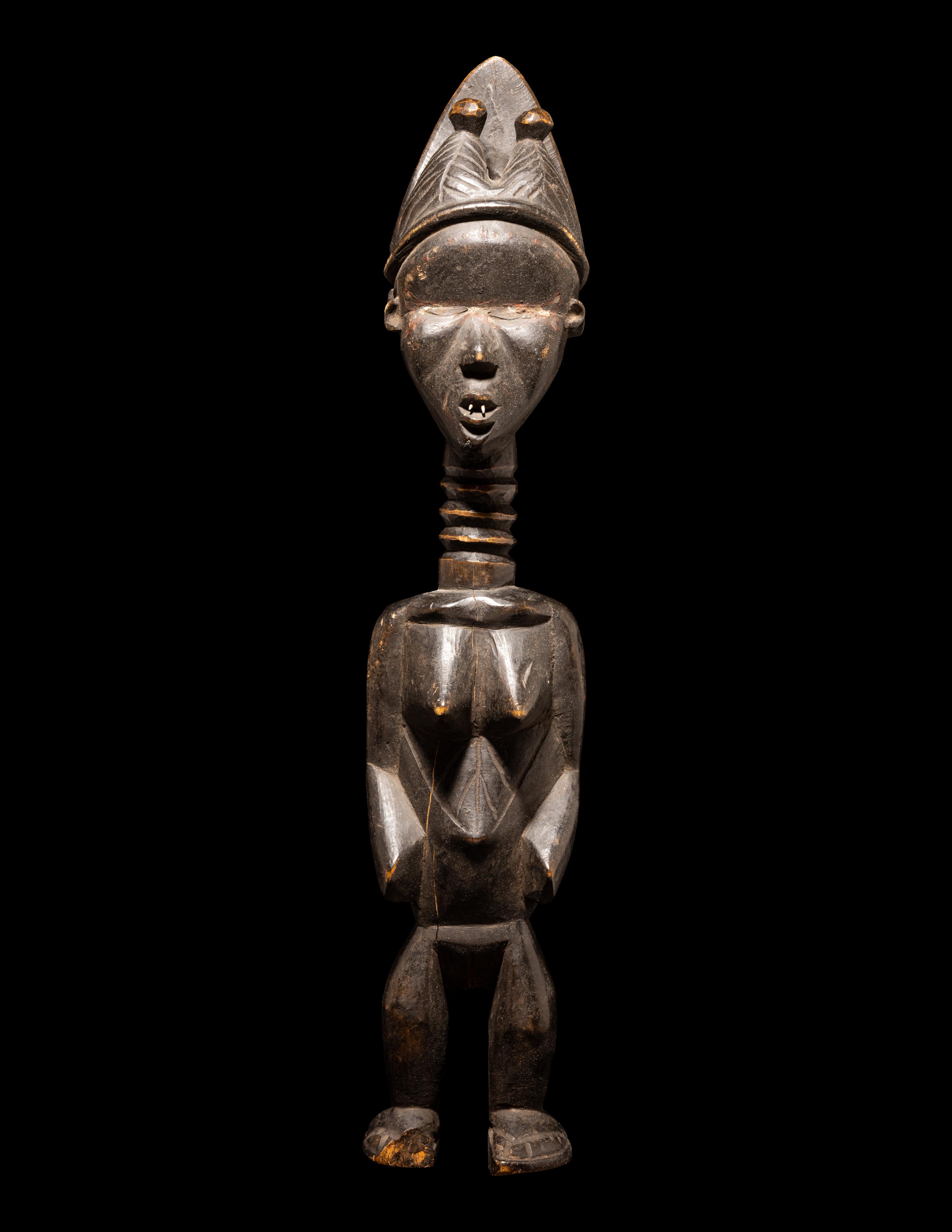 A Baule Wood Janus-Headed Figure