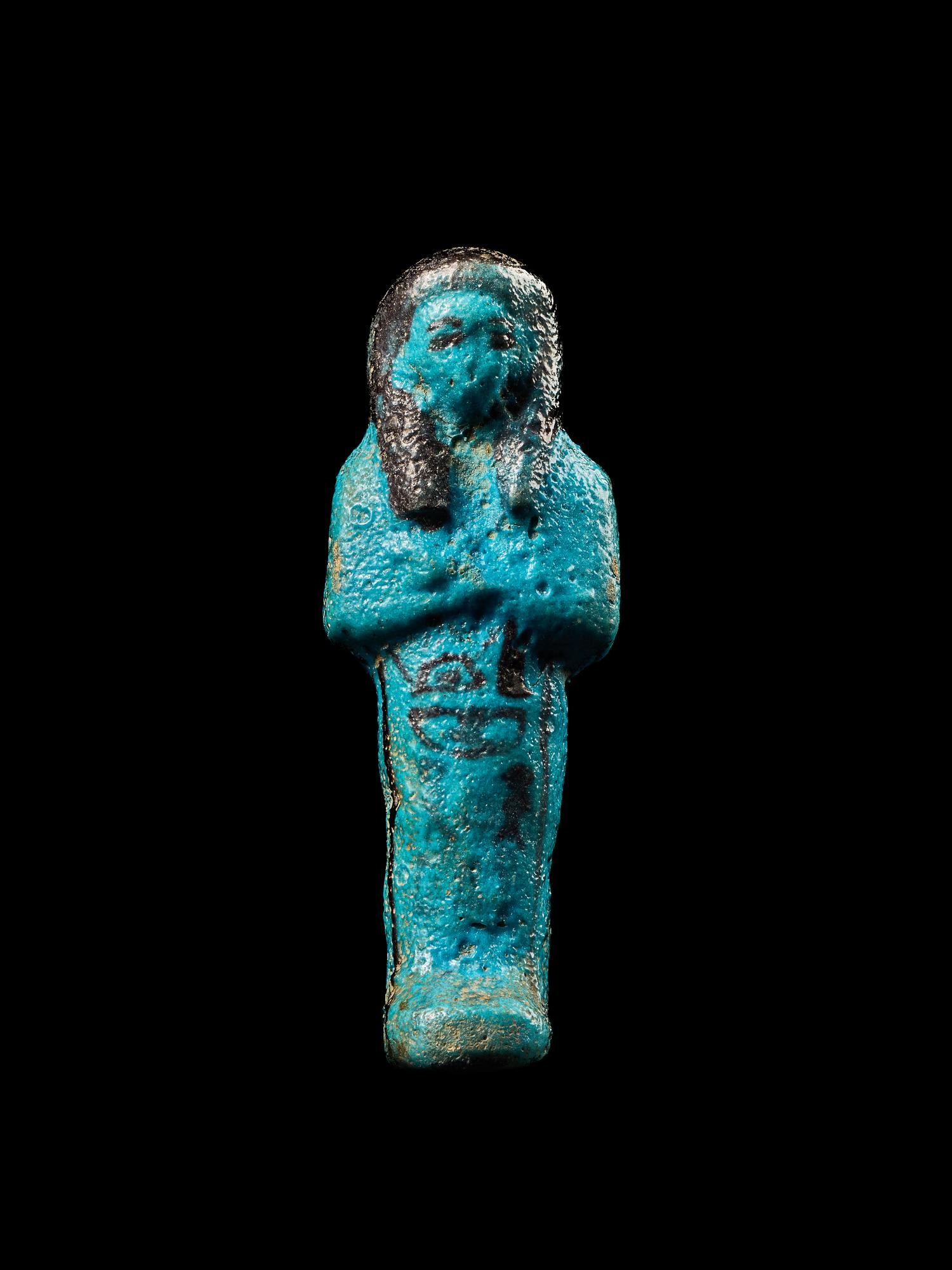 An Egyptian Blue Faience Ushabti