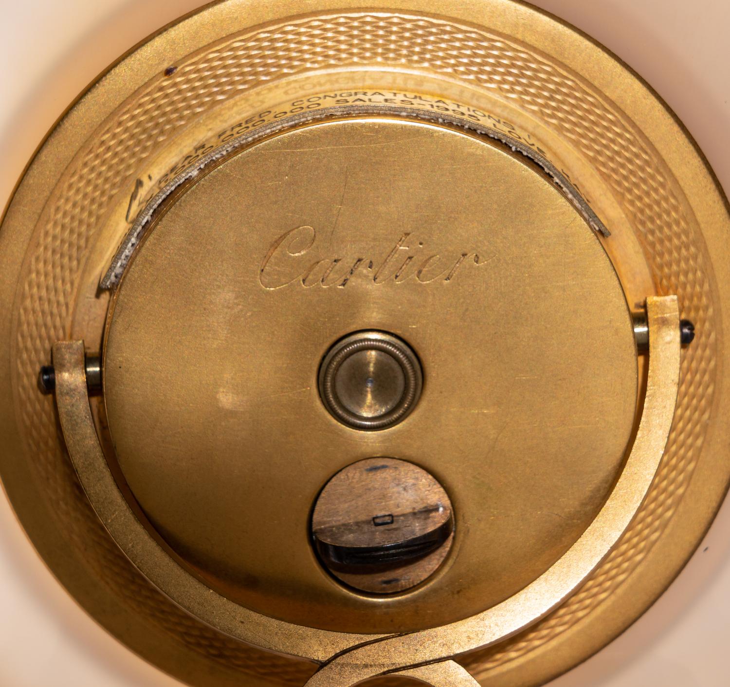 A Cartier Belle Époque Yellow Gold, Diamond, Enamel and Agate Table Clock