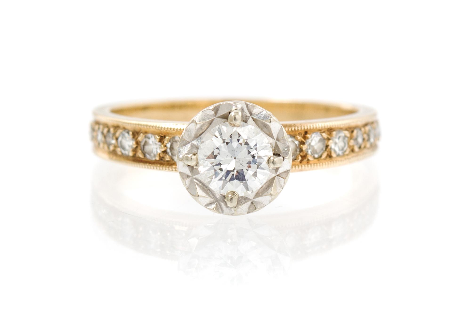 A 14 Karat Gold and Diamond Ring, 1.90 dwts.