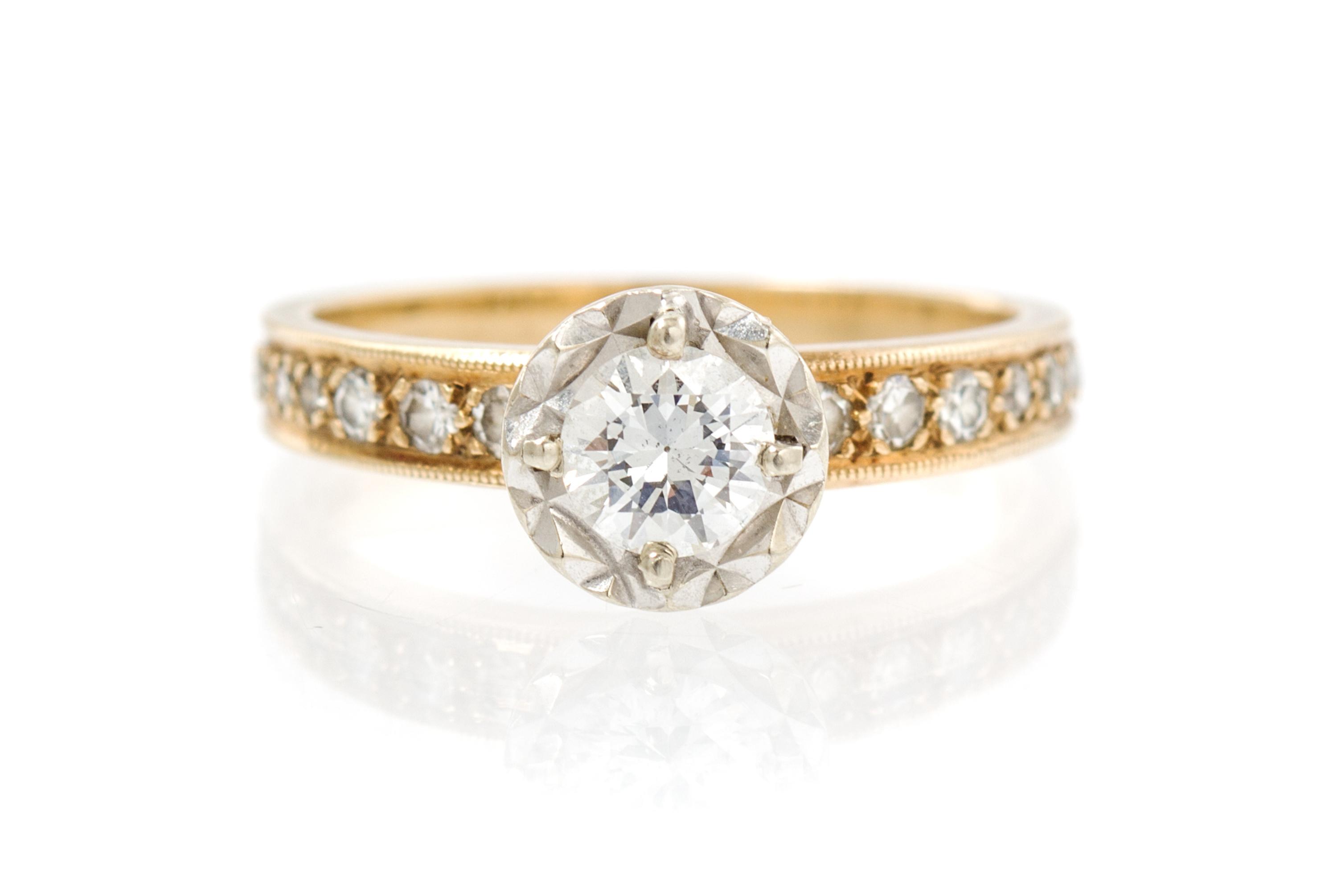 A 14 Karat Gold and Diamond Ring, 1.90 dwts.