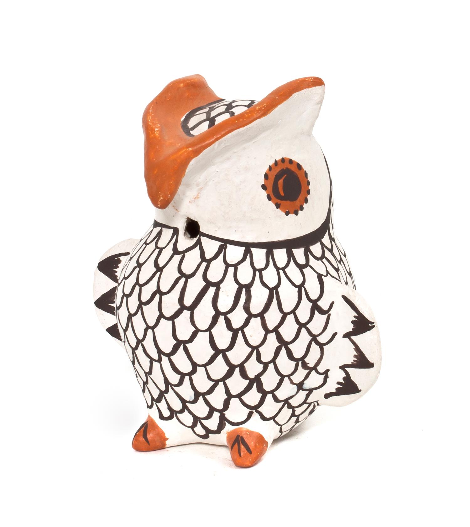 An Acoma Polychrome Owl Height 5 x diameter 3 1/2 inches.