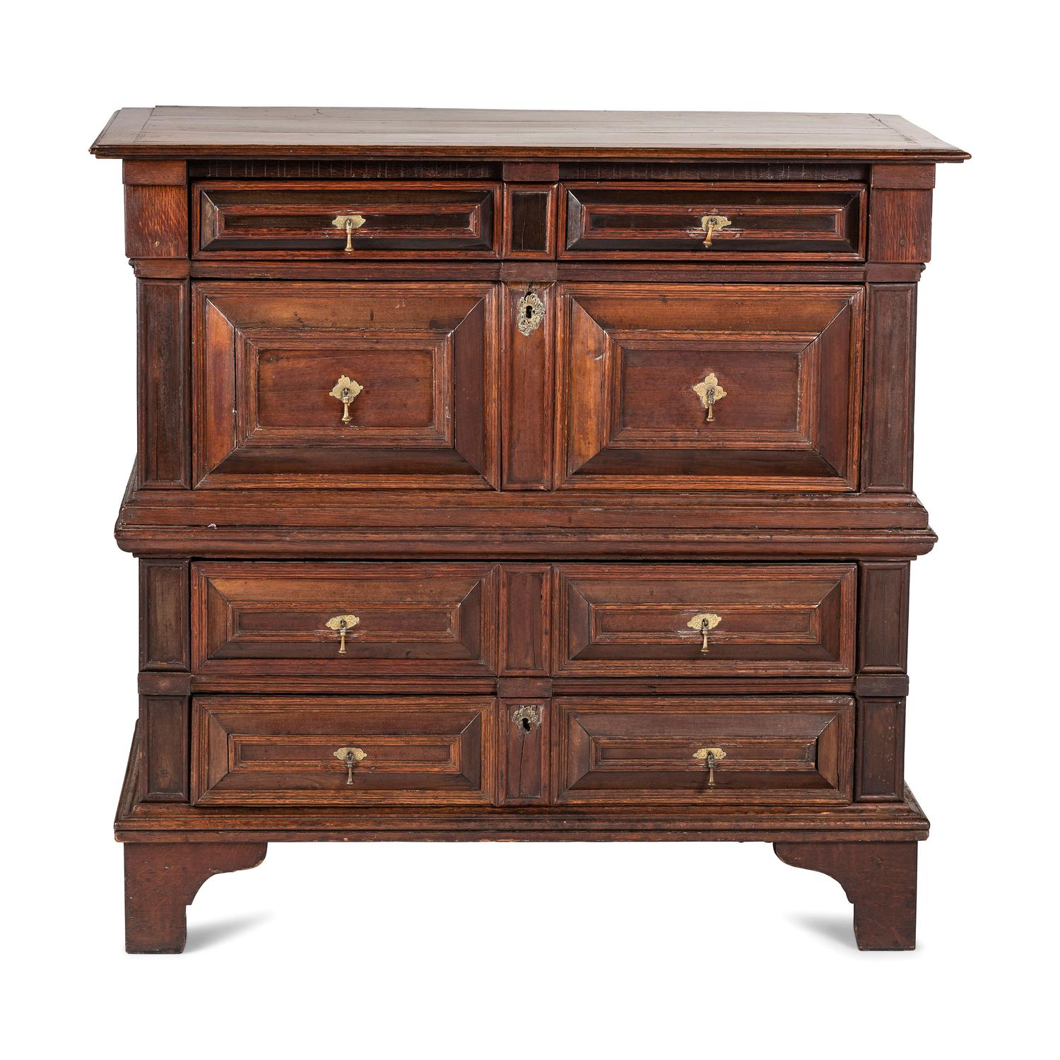 A Charles II Carved Oak Chest of Drawers