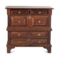 A Charles II Carved Oak Chest of Drawers