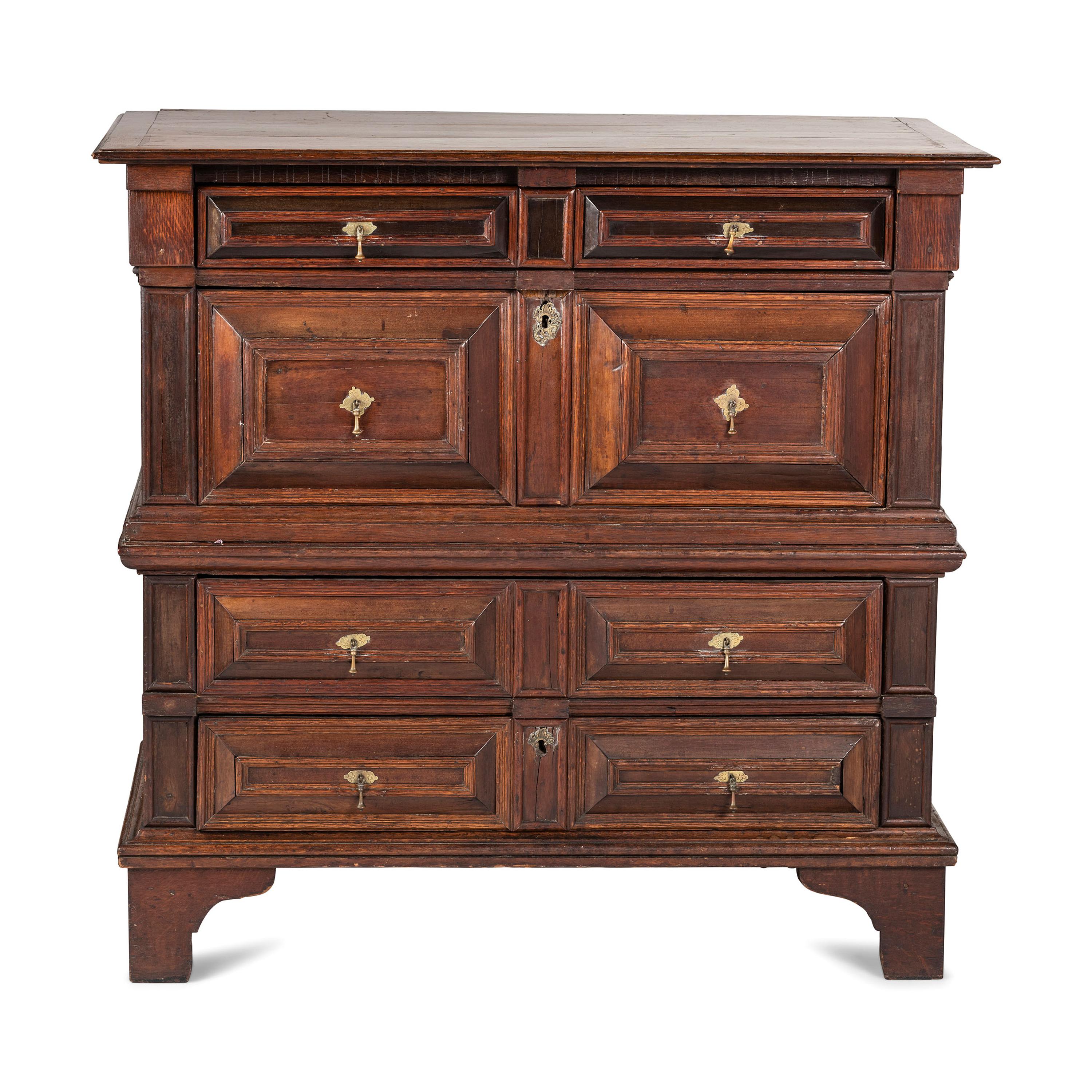 A Charles II Carved Oak Chest of Drawers