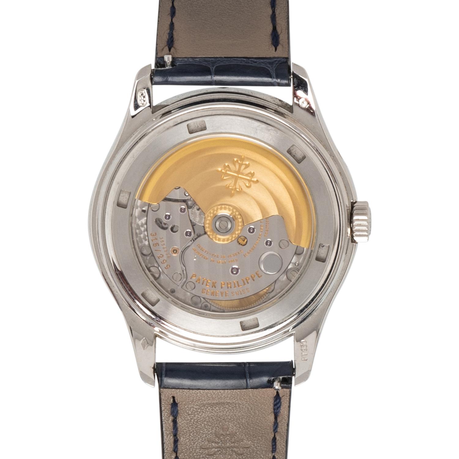 PATEK PHILIPPE, REF. 5146P PLATINUM ANNUAL CALENDAR WITH MOON PHASE WATCH, BOX & PAPERS