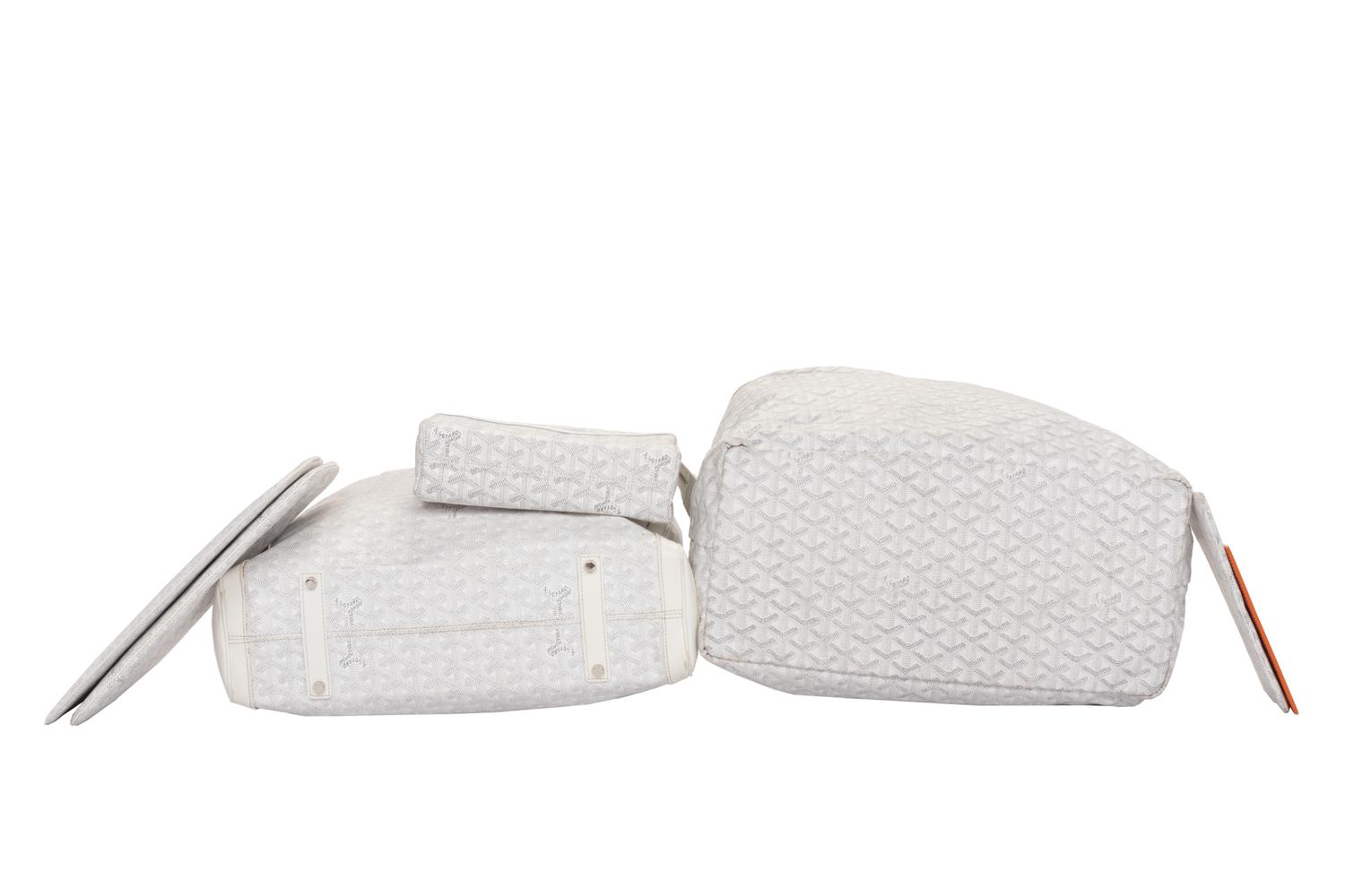 Six Goyard Items: Two Totes, Three Pouches, and One Wallet