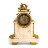 A Louis XVI Style Gilt Bronze Mounted Marble Mantel Clock