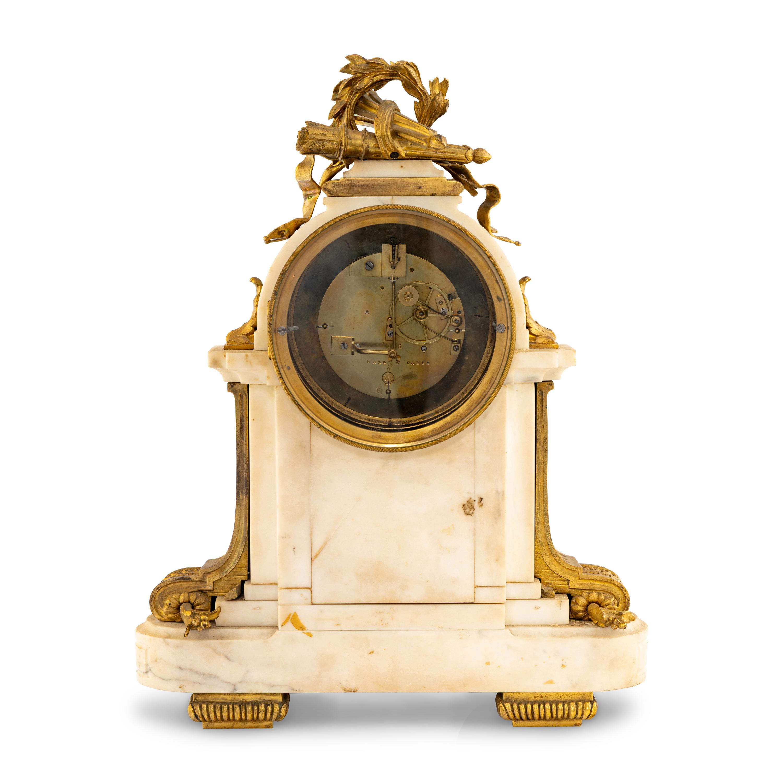 A Louis XVI Style Gilt Bronze Mounted Marble Mantel Clock