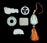 Six Chinese Carved Jade Pendants Length of largest 3 5/8 inches. — LATE 19TH/20TH CENTURY